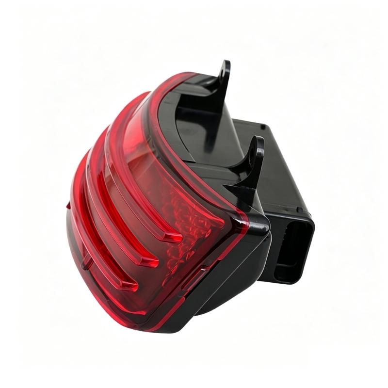 Rear LED Brake and Running Light Assembly with Preformed Mounting Holes, Curved Housing, and Red Layered Lens for Specified 2014-2023 Motorcycles