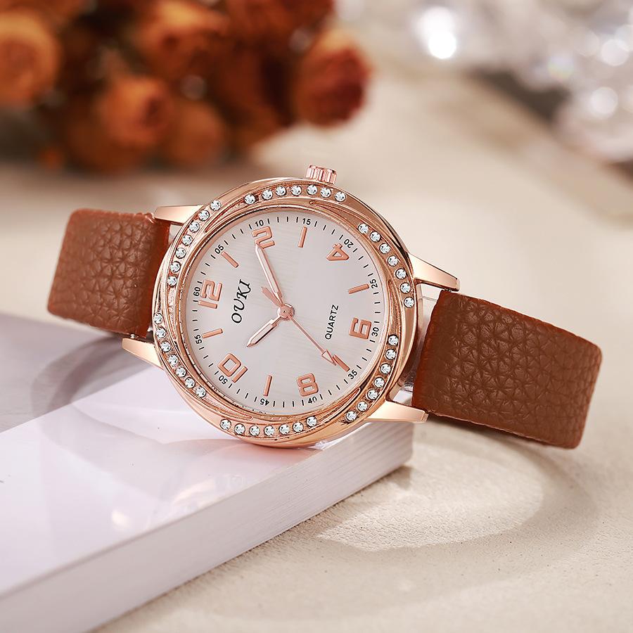 Modische Damen-Quarzuhr Studenten-Freizeit-Dekorationsuhr Strassstein-Gehäuse Damen-Uhr Damen-Uhr