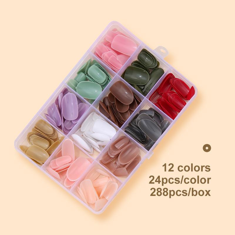 Enfärgad nagelbit Källa Nagellapp 12 färger i ask Glansig nagelbit 288 stycken