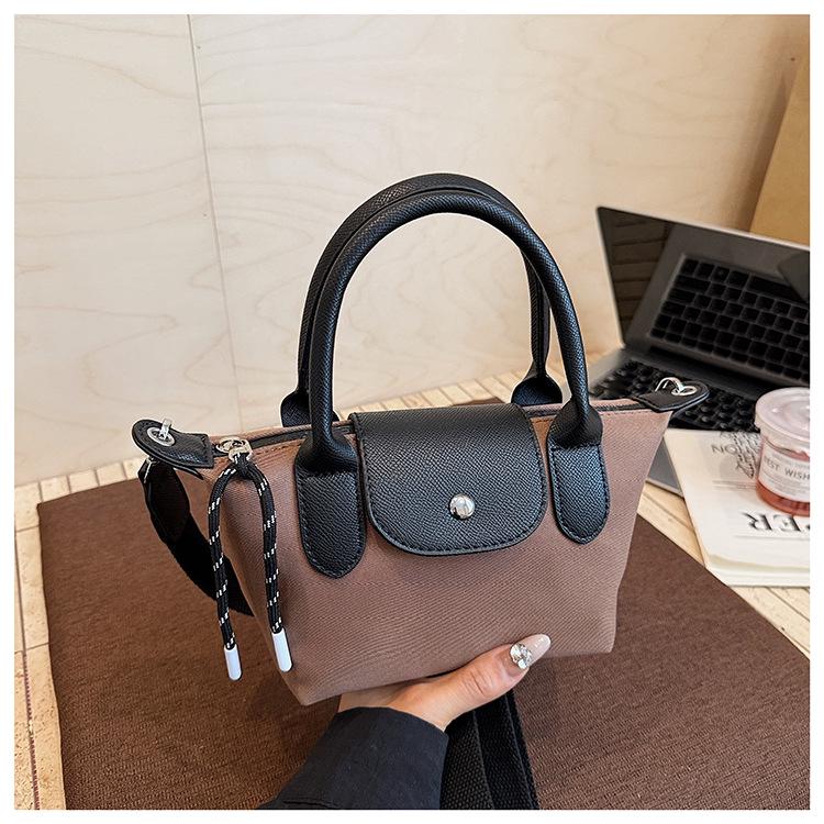 Minimalist Color-Block Oxford Cloth Handbag: Versatile, Fashionable Shoulder Bag with Unique Texture.