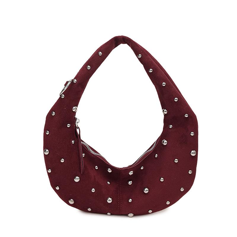 New niche underarm bag women's new fashionable versatile rivets half-moon single shoulder simple messenger women's bag