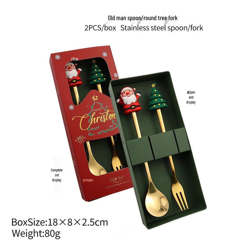 Christmas Cartoon Cutlery Set: Forks, Spoons, and Gift Box Featuring Cute Reindeer and Tree Designs.