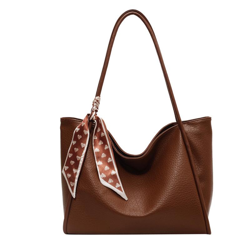 

Жіноча сумка через плече з натуральної шкіри великої місткості коричневий