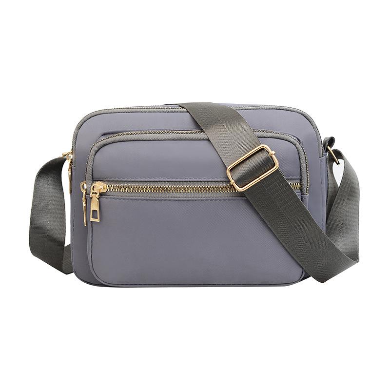 New Oxford cloth bag women's bag lightweight anti-splashing shoulder messenger bag mother bag mobile phone change cashier bag