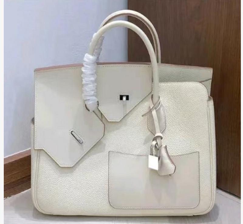 New genuine leather women's bag top layer cowhide 30CM irregular diagonal hijab Desordre handbag