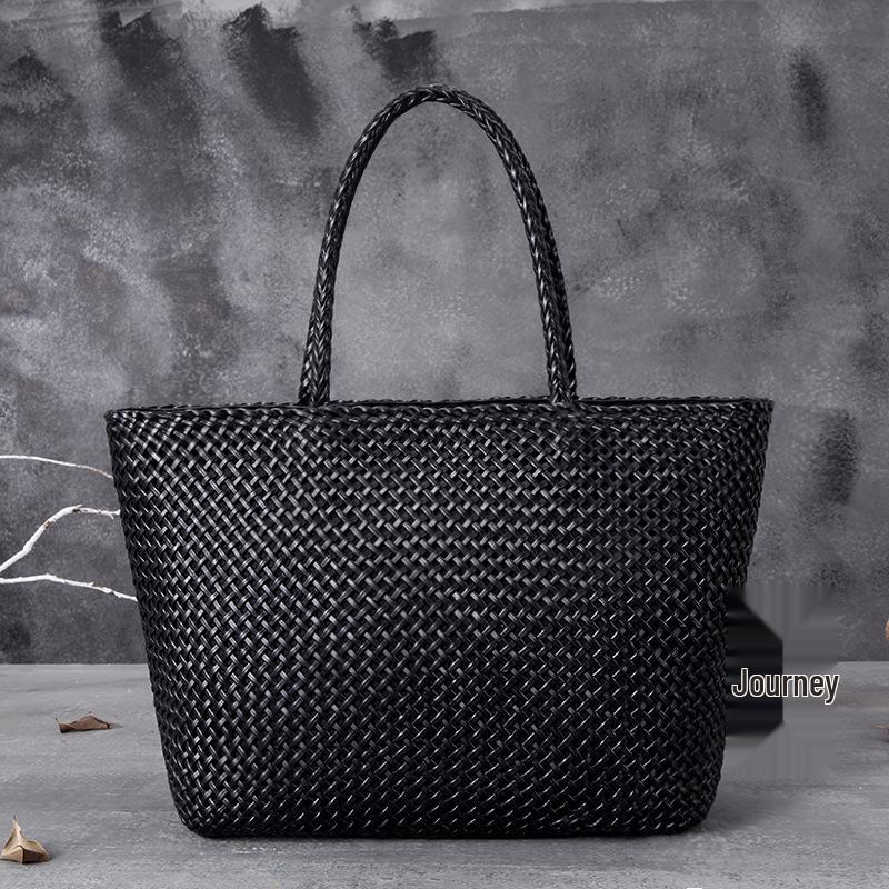 Damenhandtasche aus echtem Leder mit Aussparungen und Webmuster