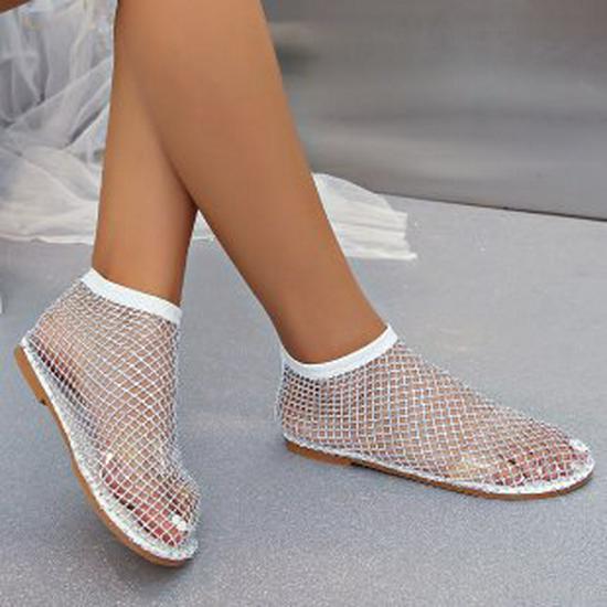 

Літні жіночі босоніжки на плоскій підошві з круглим носком та стразами, а також короткі ботильйони, великі розміри 39