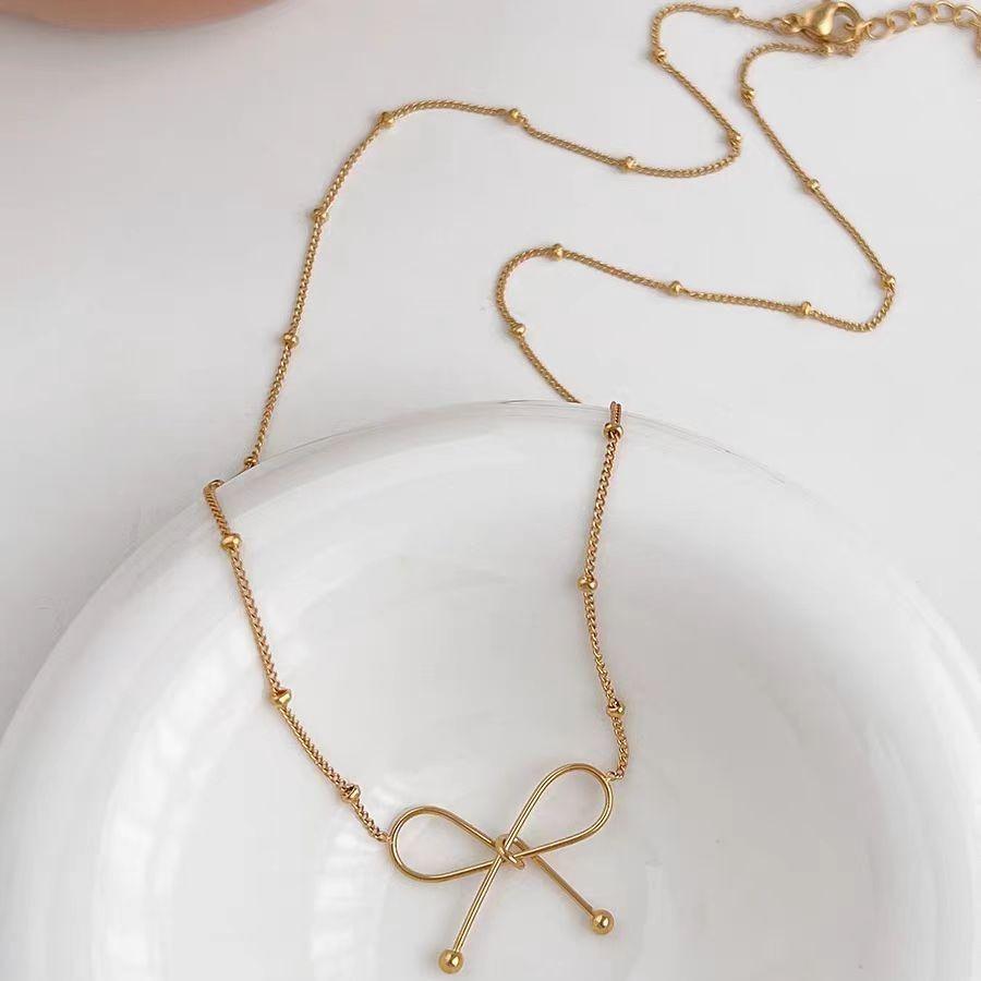 

Модное ожерелье из титановой стали с бантом для женщин. Нишевый дизайн. Интернет-аксессуары знаменитостей. Простая и универсальная легкая роскошная высококачественная цепочка на ключицы. золотой