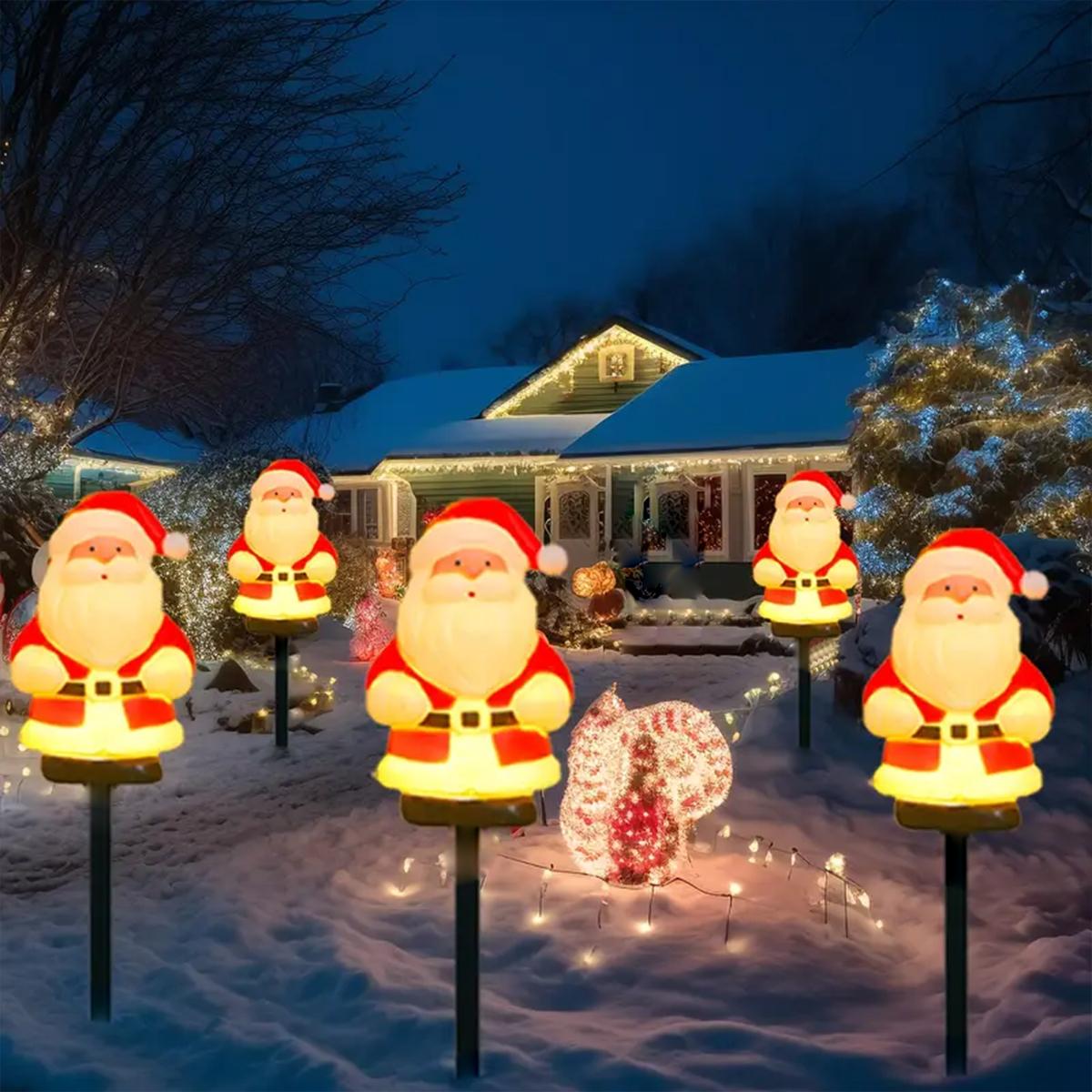 

Solar Christmas Stake Lights 5Pcs Set, Warm White Santa Figures for Garden, All-Weather Patio Pathway Decoration теплим білим кольором
