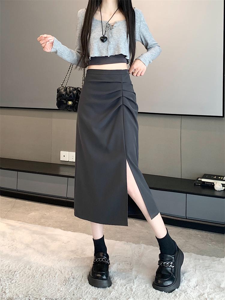 Dámská midi sukně áčkového střihu s vysokým pasem a rozparkem pro raný podzim 2025