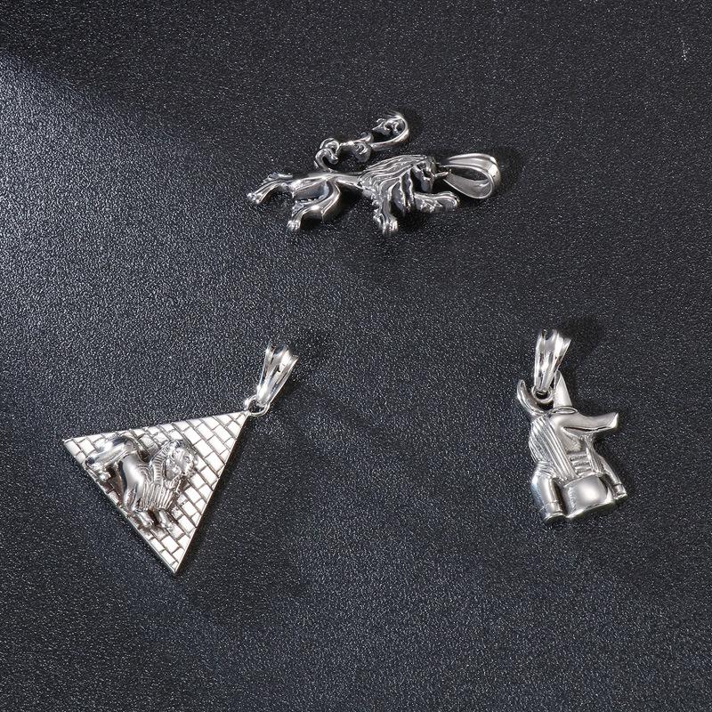 European and American Creative Personality Pyramid Lion Head Men's Titanium Steel Pendant