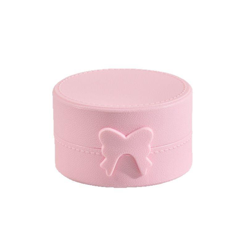 Round Single-Layer Bow Jewelry Storage Box - Solid Color Plastic with Imitation Pattern for Earrings