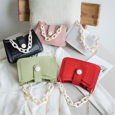 Bolsa de ombro feminina com estampa de pedra e axila