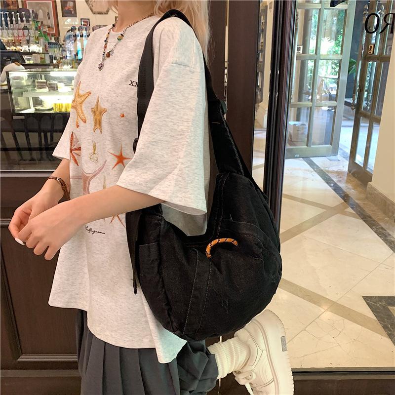 

Crossbody dumpling bag, women s bag, large capacity Korean versi, thick denim cloth bag for work and commuting, Qianxi spicy g