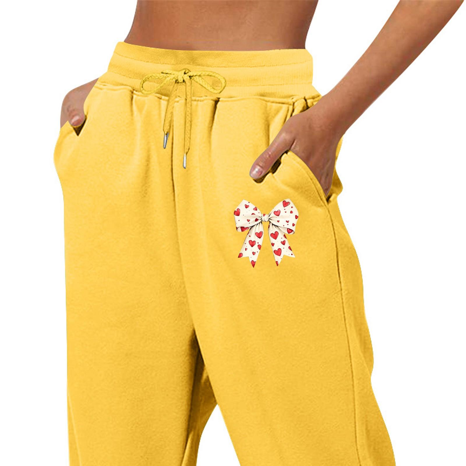 

Модні жіночі повсякденні брюки на зав язках з весною та однотонним принтом XL жовтий