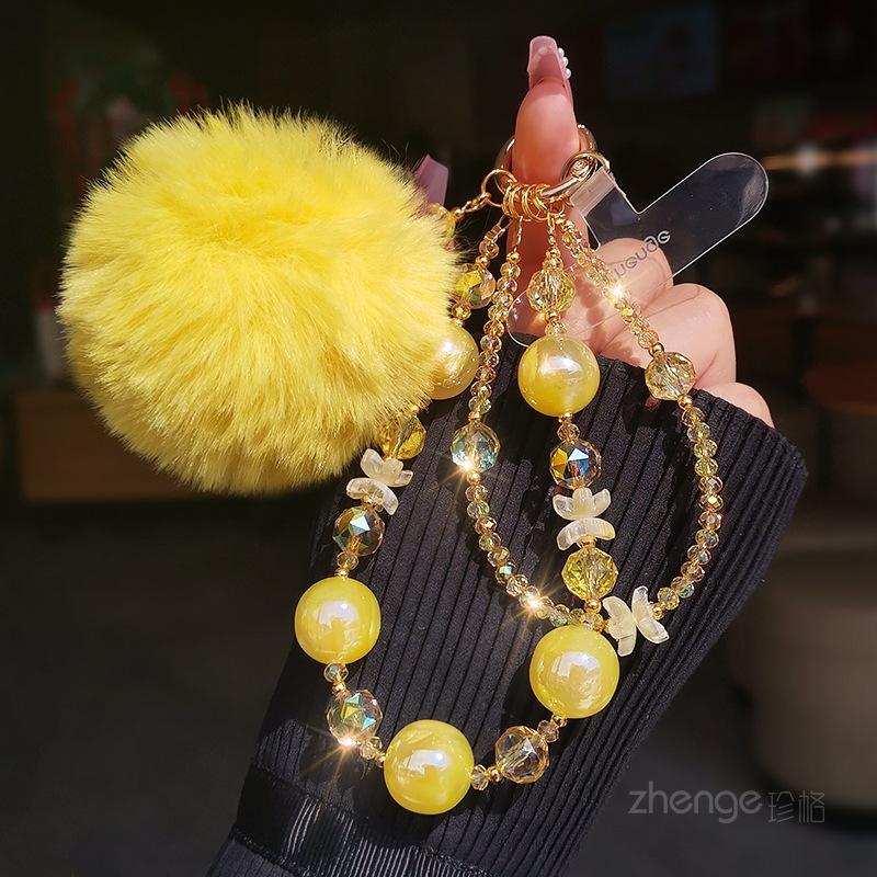 

Mobile phone chain pendant women s niche high-value crystal beaded flower ornament wrist rope short outdoor travel line shopping