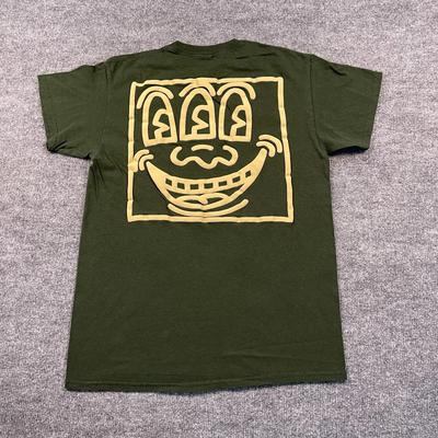 Keith-Haring Mostro a Tre Occhi Smiley Maglietta Artistica Media 19x26 Verde