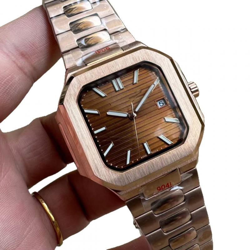 Patek Philippe Nautilus 5821 Men's Gold Automatic Mechanical Watch with Large Dial and Calendar.