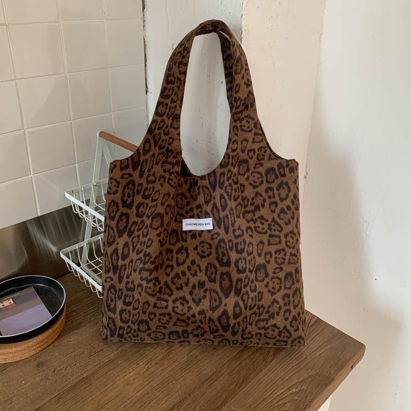 

2025 autumn new niche shoulder bag fabric tote bag trend high value simple personality simple women s bag коричневый