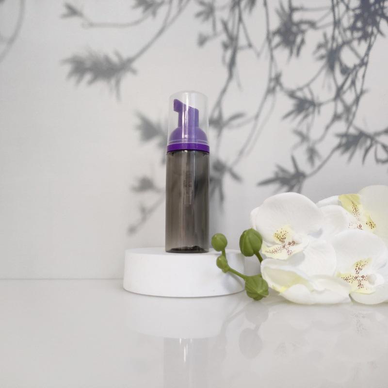 Available 60ml Transparent Black Foam Mousse Bottle for Face Wash and Travel-friendly Cosmetic Packaging.