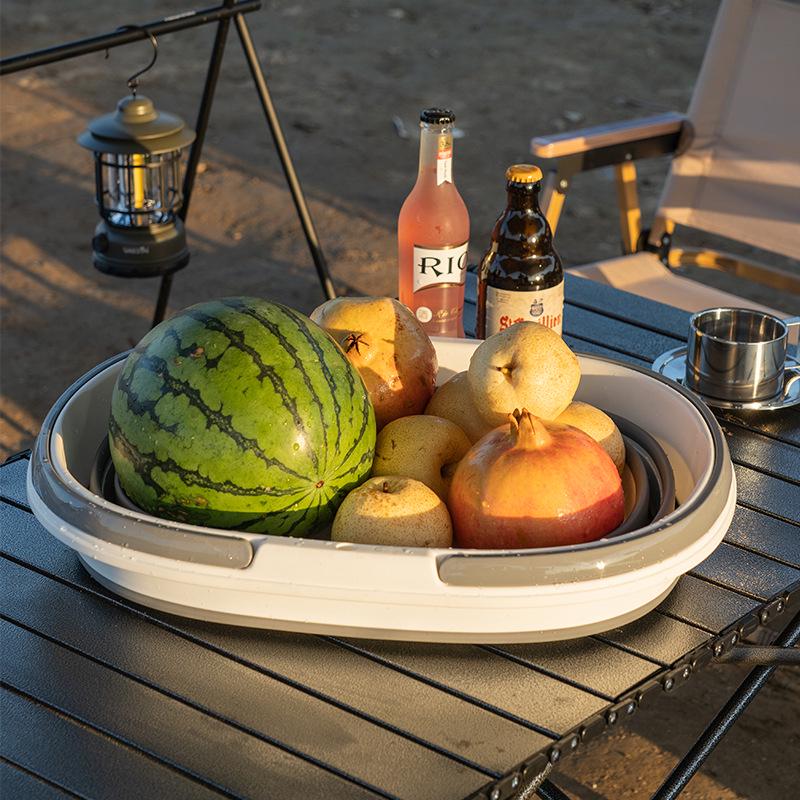 Foldable Household Storage Bucket with Handle - Large Capacity, Portable for Outdoor Camping, Car Use, or Laundry.