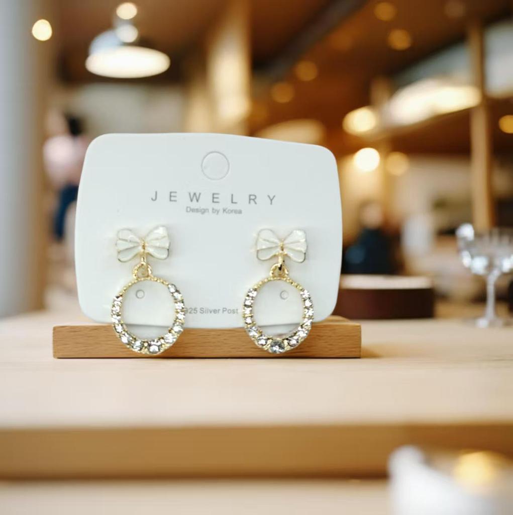 Elegant Rhinestone Bow Earrings for Women - Hollow, Round Design