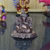 Metal Lord Ganesha On Flower Figurine