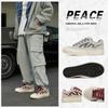 Chaussures de skate décontractées tendance 2025 nouveau style rétro chaussures blanches chaussures polyvalentes chaussures étudiantes tendance street photography style ins pour hommes
