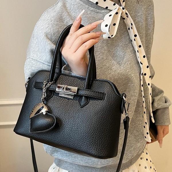 Simple temperament hand bag women's spring new niche fashion messenger bag commuter shoulder bag