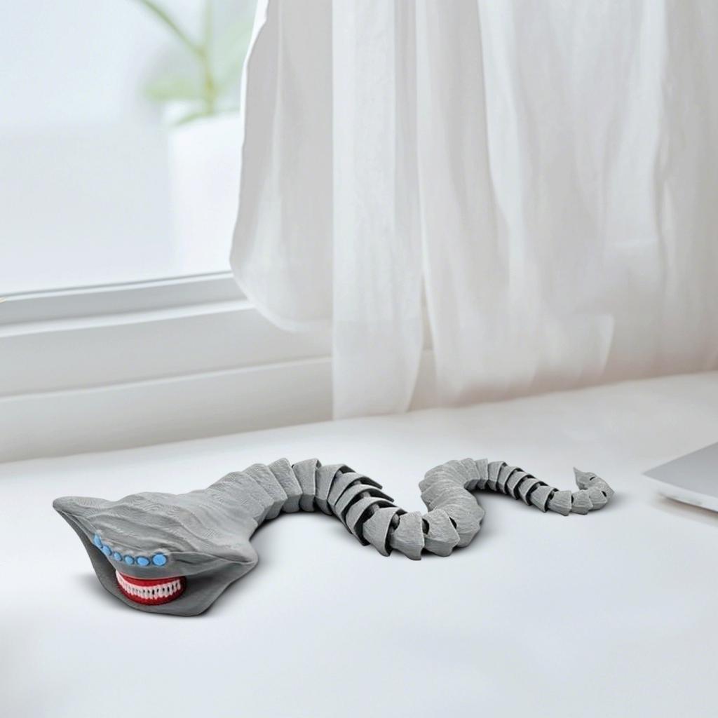 The Sea Devourer 3D Printed Flexible Fingertip Toy Is A Creative And Novel Sensory Stress-relieving Toy Themed Around A Sea .