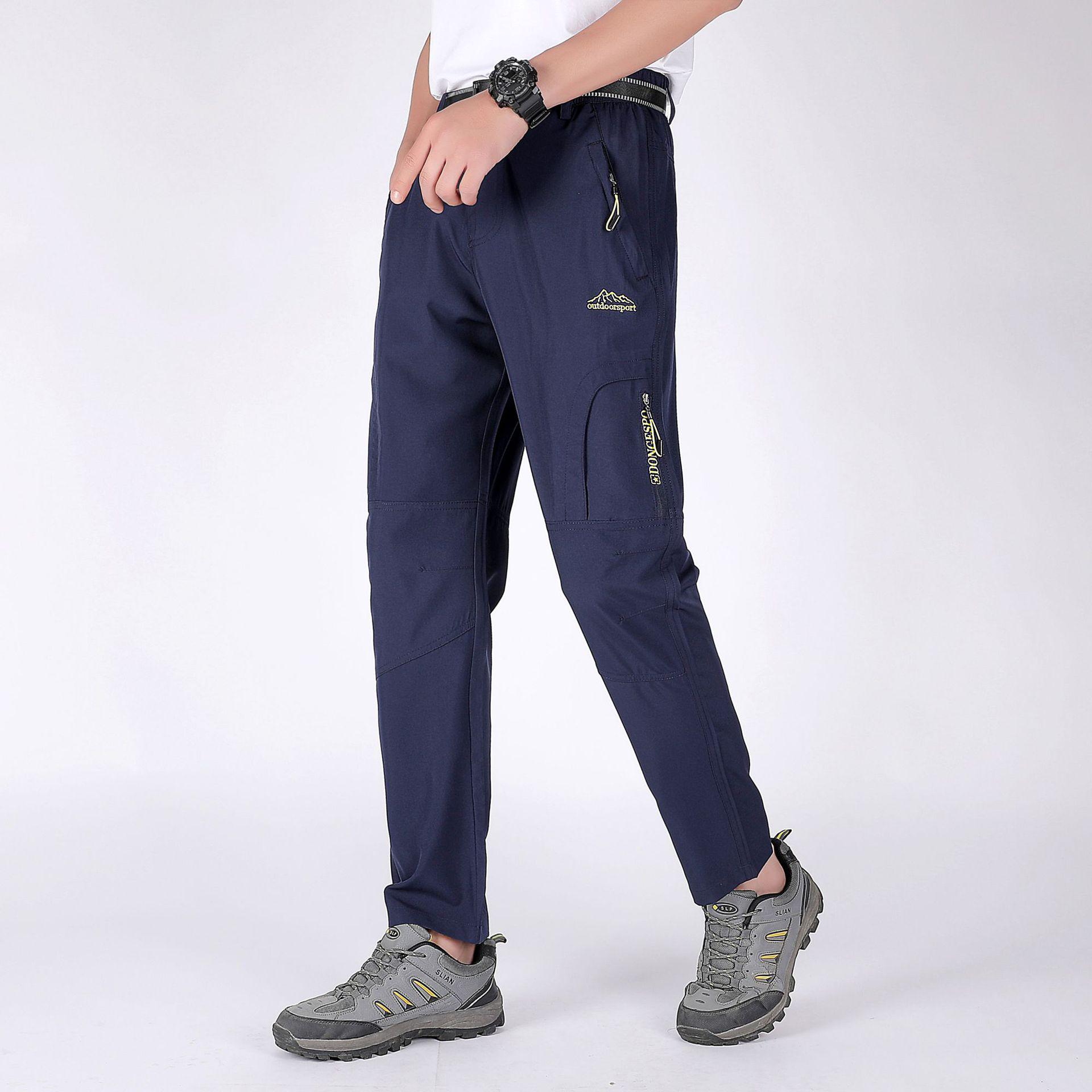 

Чоловічі літні швидкосохнучі водонепроникні дихаючі ультратонкі вільні штани 4XL темно-синього кольору