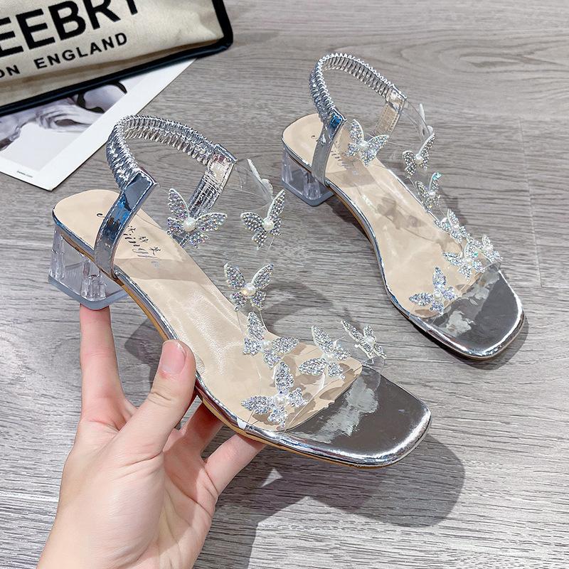 Sandalen Damen 2025 Sommer neu Römisch elastisches Band Strass Feenstil Mode transparent dicker Absatz Kristall hohe Absätze