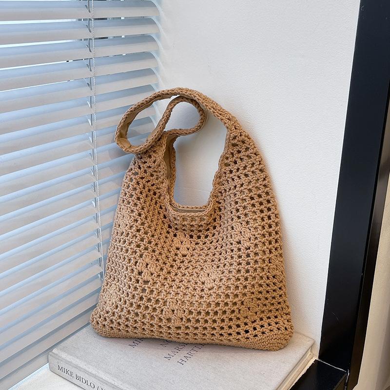 Niche hollow bucket bag women's summer new fashion woven beach bag leisure vacation shoulder bag