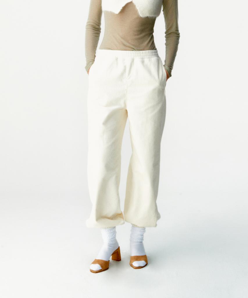 Kueoumeon Corduroy Curved Jogger Pants (Cream)