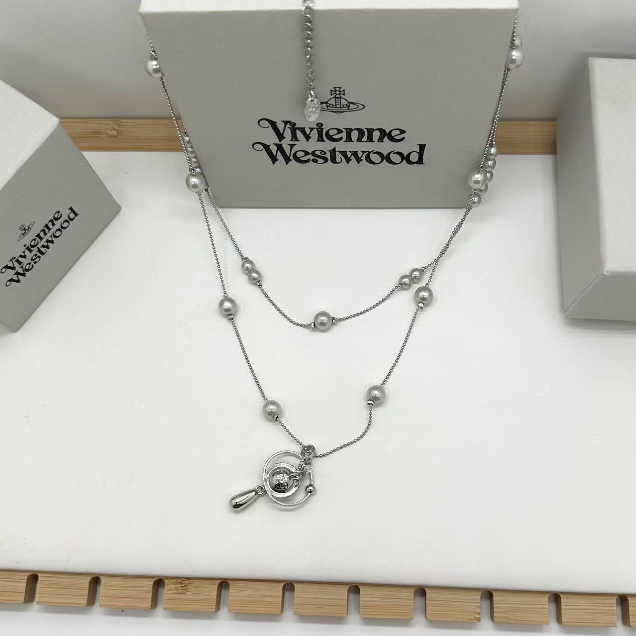 

Двойное ожерелье Planet Pearl, женская нишевая дизайнерская высококачественная цепочка на шею, цепочка на ключицу, легкие роскошные аксессуары