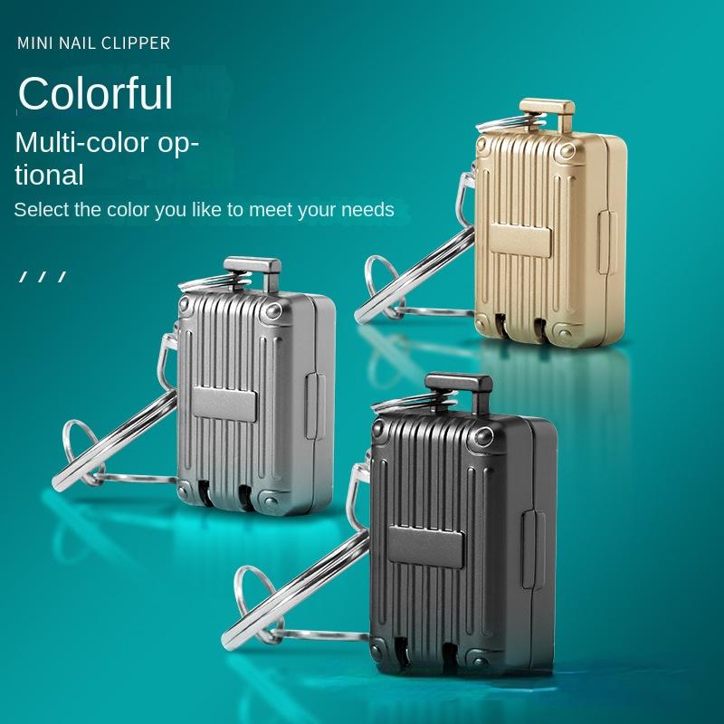 

Stainless Steel Fingernail Clipper Metal Foldable Mini Nail Clipper Trim Nails Creative Luggage Shape Keychain золотий