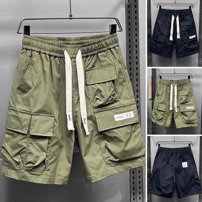 Short cargo pour homme, taille élastique, cordon de serrage réglable, multi-poches, jambes larges, séchage rapide, pour le fitness et la course à pied