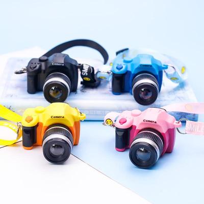 Mini Smiling Doll Camera Pendant with Luminous Ribbon and Plush