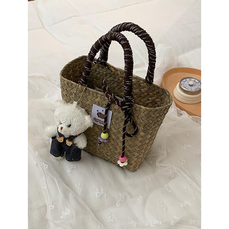 

Summer handwoven bag women s 22 new portable vegetable basket bag niche fashion beach bag straw bag