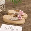 Bohemian Small Fragrant Style Imitation Grass Rope Woven Applique Flip-flops Xia Liang Slippers Women Wear Wedge Heels High Heels Beach Shoes