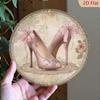Vintage Metal Wall Art 8x8 Inch, Elegant Lace Pearl High Heel Shoe Decor with Floral Bow, Round Hanging Ornament for Home Bedroom Living Room