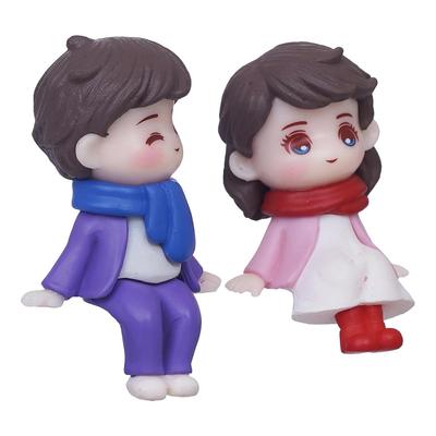 Valentine Gift For Girlfriend Boyfriend Cute Boy And Girl Sitting Couple Statue Decorative Showpiece (Polyresin) Valentine Day Gift For Husband Wife |