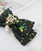 Maia Rose Jacquard Ribbon Pin In Black
