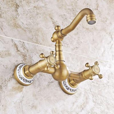 Antique Brass Ceramic Wall-Mounted Bathroom Faucet with Rotating Anti-Splash Feature for Hot and Cold Water