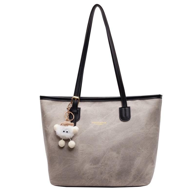 Niche high-end design tote bag large-capacity commuting leisure texture shoulder messenger bag pendant bag