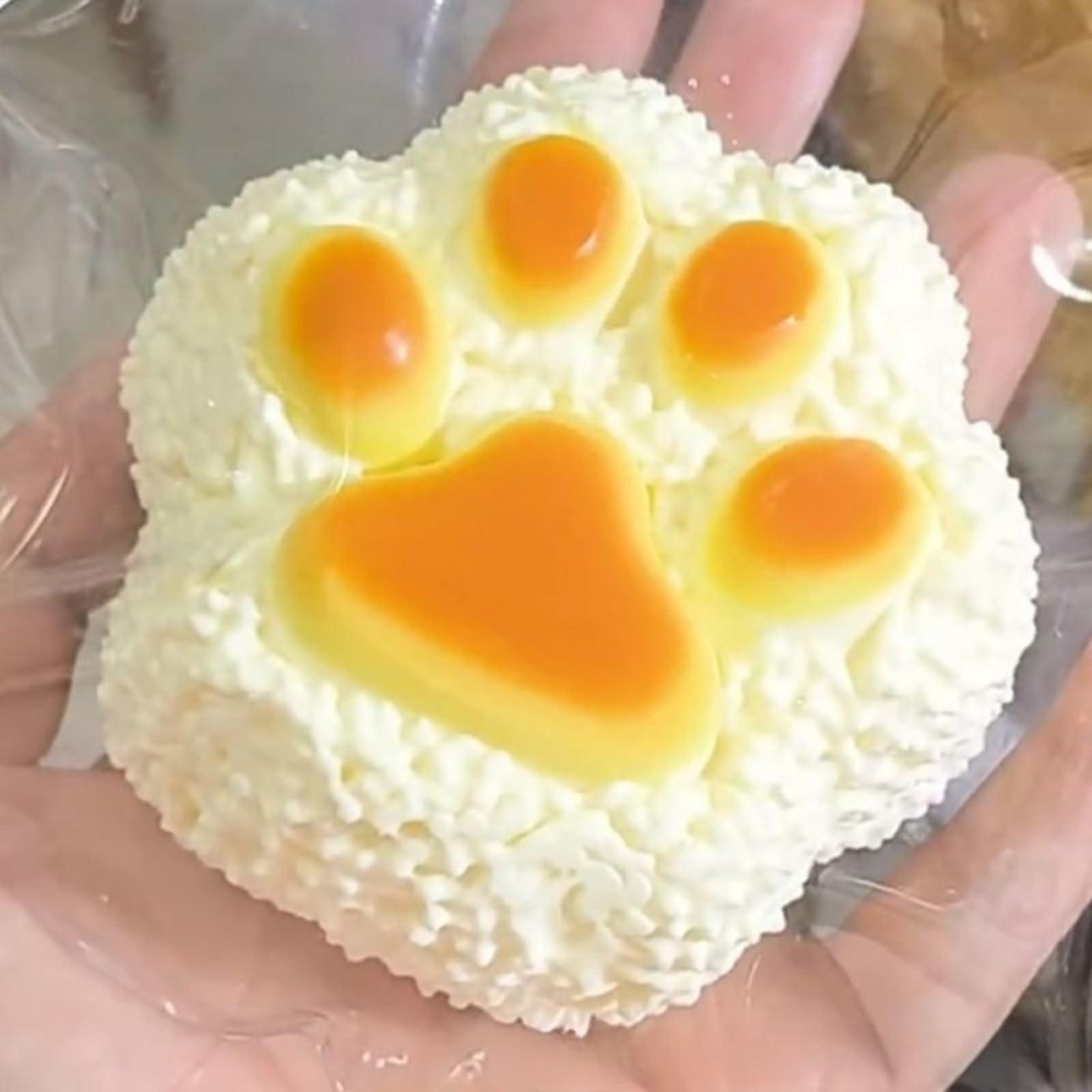 soft and squishy cat paw cake toy with slow rebound and a soft texture for stress Features a elastic a pleasant squeezing and a cat paw print design