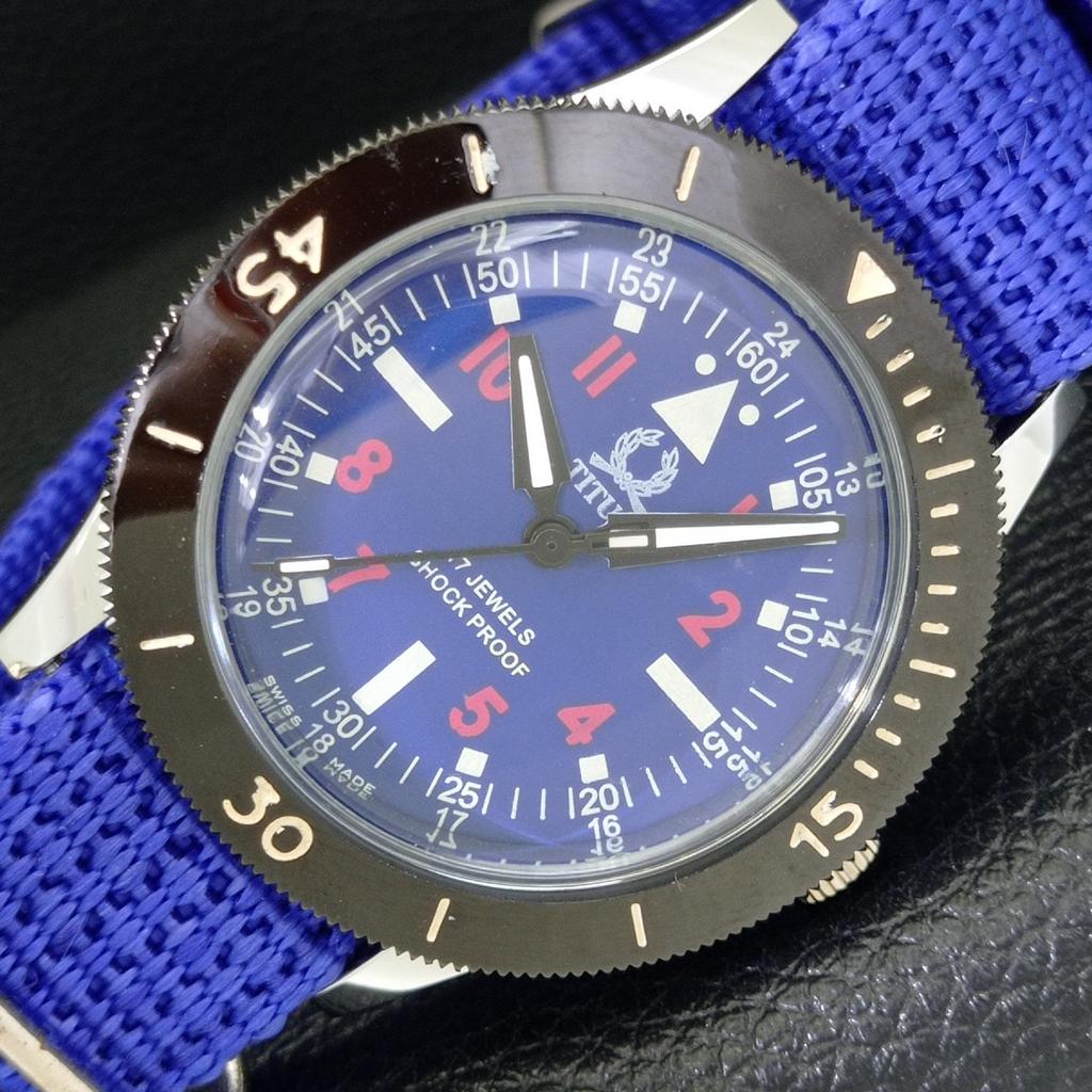 

SWISS MENS VINTAGE TITUS HAND-WINDING TURNABLE BEZEL BLUE DIAL WATCH a700018-5 R201-a700018