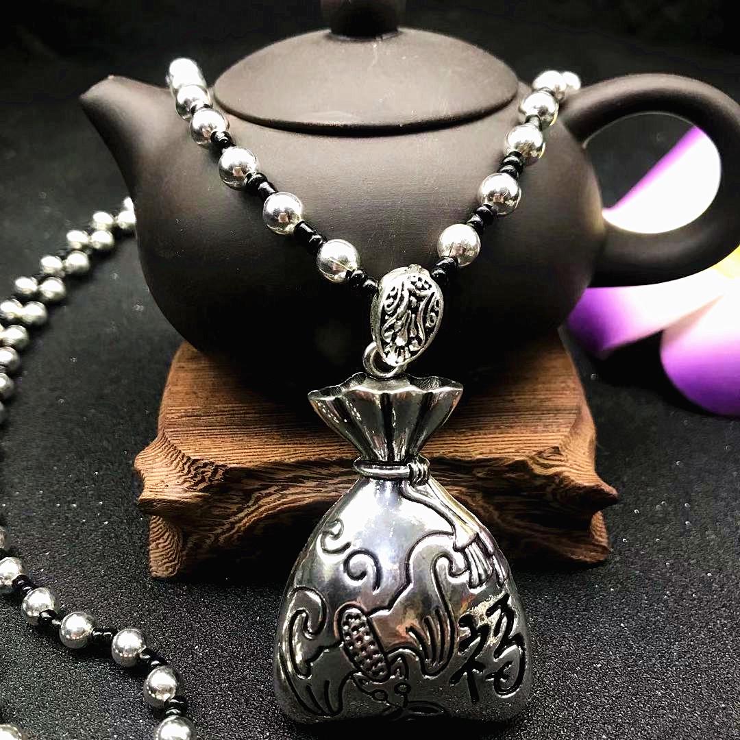 Ethnic Tibetan Silver Pendant Necklace: Fashionable, Versatile Long Chain for Spring/Summer.
