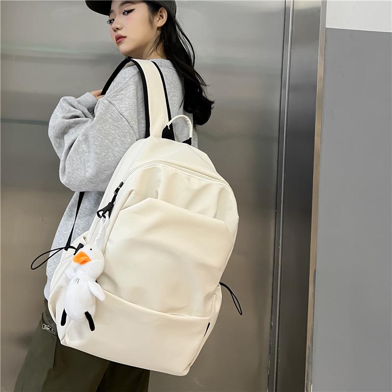 Schoolbag large capacity solid color backpack female Korean version simple versatile schoolbag male junior high school backpack female