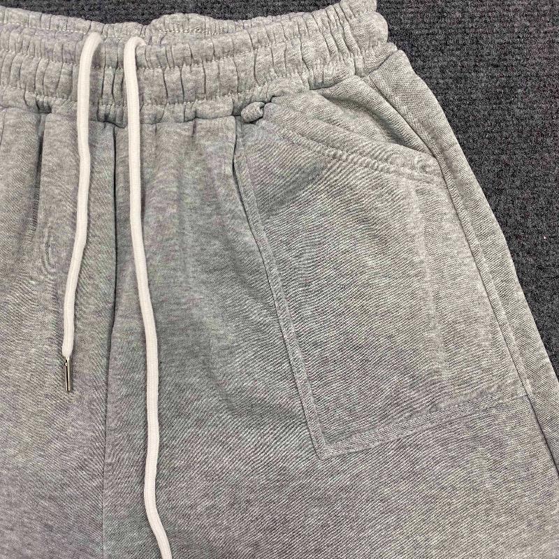 Evropské a americké letní jednobarevné volné sportovní ležérní hip-hopové tříčtvrteční kalhoty